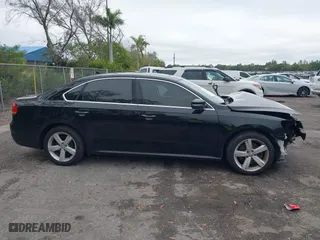 2013 Volkswagen Passat SE w/Sunroof with VIN 1VWBH7A33DC150043, listed as a IAAI auction lot 41411518 with 132,208 mi miles. Bid and sale history available at carsss.com. Image 14.