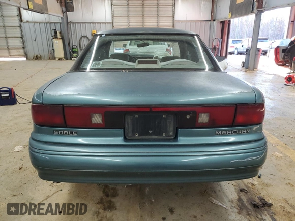 1992 Mercury Sable GS z VIN 1MELM50U7NA643480, wystawiony jako Copart lot #84833624 z przebiegiem 19 580 mil mil oraz Szkody całkowita. Historia ofert i sprzedaży dostępna na DreamBid. Obrazek 6.