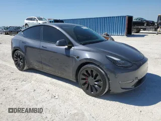 2022 Tesla Model Y Performance z VIN 7SAYGDEF5NF574382, wystawiony jako Copart lot #48531565 z przebiegiem 35 165 mil mil oraz Szkoda całkowita • Salvage title. Historia ofert i sprzedaży dostępna na DreamBid. Obrazek 4.
