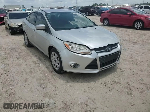 2012 Ford Focus SE with VIN 1FAHP3F29CL287498, listed as a Copart auction lot 61476855 with 139,801 mi miles and Salvage title. Bid and sale history available at DreamBid. Image 13.