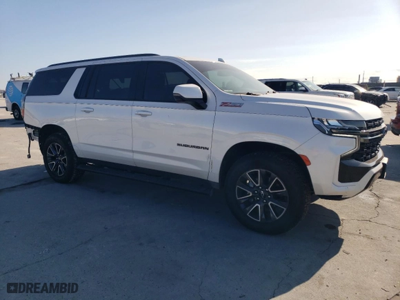 2022 Chevrolet Suburban Z71 with VIN 1GNSKDKD6NR344436, listed as a Copart auction lot 86920644 with 28,430 mi miles and Salvage Title. Bid and sale history available at carsss.com. Image 4.