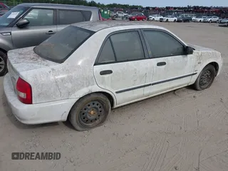 2003 Mazda Protege DX with VIN JM1BJ225730146488, listed as a IAAI auction lot 42086747 with Not Provided miles and . Bid and sale history available at DreamBid. Image 4.