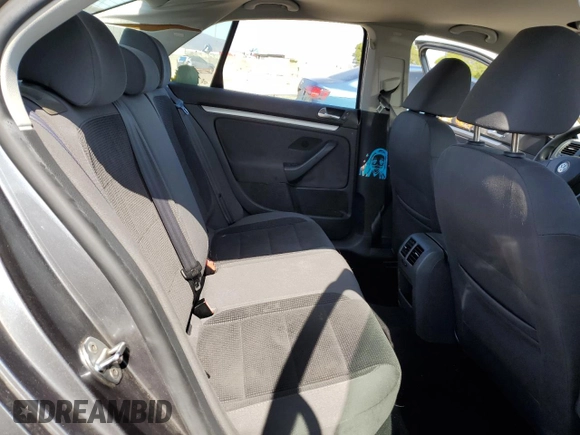 2009 Volkswagen Jetta S с VIN 3VWJZ71K49M014297, выставлен на аукционе Copart как лот 57055395 с пробегом 129 029 миль миль и Чистый • Clean title. История ставок и продаж доступна на DreamBid. Изображение 10.