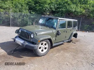2015 Jeep Wrangler Unlimited Altitude z VIN 1C4HJWEG0FL752152, wystawiony jako IAAI lot #42311043 z przebiegiem 112 379 mil mil oraz . Historia ofert i sprzedaży dostępna na DreamBid. Obrazek 2.