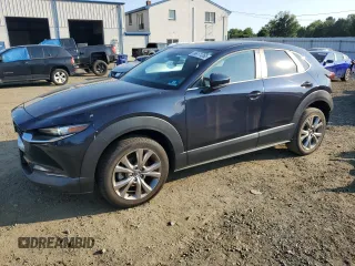 2020 Mazda CX-30 Preferred with VIN 3MVDMBDL2LM107900, listed as a Copart auction lot 66171265 with 77,085 mi miles and Salvage title. Bid and sale history available at DreamBid. Image 1.