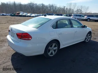 2012 Volkswagen Passat SE with VIN 1VWBP7A38CC020227, listed as a IAAI auction lot 41644536 with 227,205 mi miles. Bid and sale history available at carsss.com. Image 4.