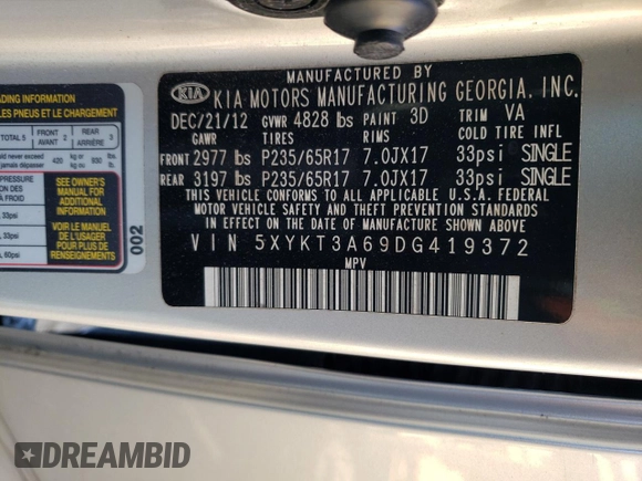 2013 Kia Sorento LX z VIN 5XYKT3A69DG419372, wystawiony jako Copart lot #55088725 z przebiegiem 90 327 mil mil oraz Szkoda całkowita • Salvage title. Historia ofert i sprzedaży dostępna na DreamBid. Obrazek 14.