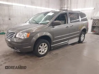 2010 Chrysler Town & Country Touring Plus with VIN 2A4RR8D17AR393916, listed as a IAAI auction lot 42171114 with 123,741 mi miles. Bid and sale history available at carsss.com. Image 2.