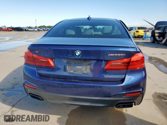 2020 BMW 5 Series M550i xDrive with VIN WBAJS7C09LCE06865, listed as a Copart auction lot 60140955 with Not provided miles and Salvage title. Bid and sale history available at DreamBid. Image 6.