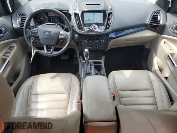 2018 Ford Escape Titanium with VIN 1FMCU0J93JUB20136, listed as a Copart auction lot 56841065 with 129,954 mi miles and Salvage title. Bid and sale history available at DreamBid. Image 8.