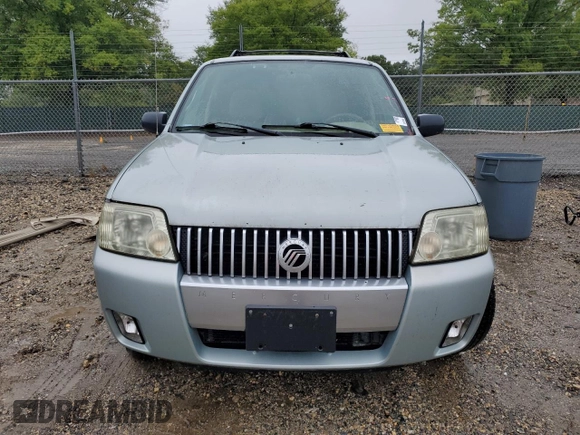 2005 Mercury Mariner Luxury z VIN 4M2CU56185DJ12005, wystawiony jako Copart lot #73570914 z przebiegiem 185 354 mil mil oraz Tytuł czysty. Historia ofert i sprzedaży dostępna na DreamBid. Obrazek 5.