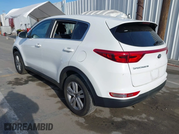 2019 Kia Sportage LX with VIN KNDPM3AC0K7535675, listed as a IAAI auction lot 41933482 with 118,012 mi miles and . Bid and sale history available at DreamBid. Image 3.