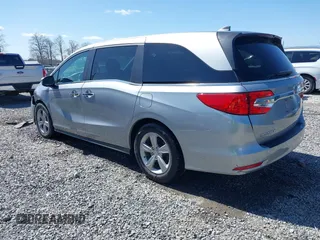 2018 Honda Odyssey EX-L with VIN 5FNRL6H75JB092633, listed as a IAAI auction lot 41971589 with 103,099 mi miles and . Bid and sale history available at DreamBid. Image 3.