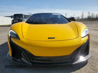 2016 McLaren 650S with VIN SBM11FAA6GW006251, listed as a Copart auction lot 52177065 with 14,614 mi miles and Clean Title. Bid and sale history available at DreamBid. Image 5.