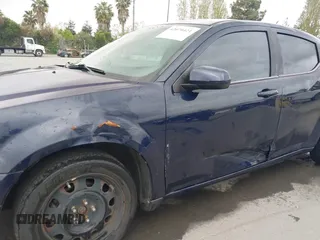 2013 Dodge Avenger SXT with VIN 1C3CDZCB0DN662712, listed as a IAAI auction lot 42070421 with 160,434 mi miles and . Bid and sale history available at carsss.com. Image 12.