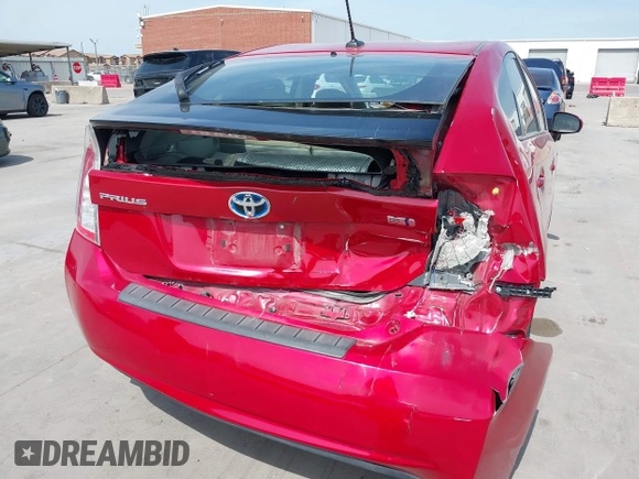 2012 Toyota Prius One with VIN JTDKN3DU8C5499775, listed as a IAAI auction lot 42065022 with 104,499 mi miles and . Bid and sale history available at carsss.com. Image 6.
