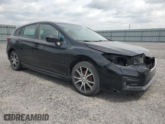 2018 Subaru Impreza with VIN 4S3GTAF65J1751579, listed as a Copart auction lot 61690535 with 77,316 mi miles and Salvage title. Bid and sale history available at DreamBid. Image 4.
