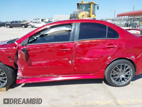2015 Mitsubishi Lancer GT with VIN JA32U8FW9FU014308, listed as a IAAI auction lot 41982416 with 227,574 mi miles. Bid and sale history available at carsss.com. Image 14.