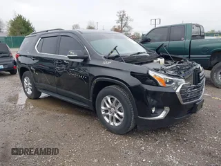 2021 Chevrolet Traverse LT Cloth z VIN 1GNEVGKW3MJ146501, wystawiony jako IAAI lot #41970389 z przebiegiem 128 302 mil mil oraz . Historia ofert i sprzedaży dostępna na DreamBid. Obrazek 1.
