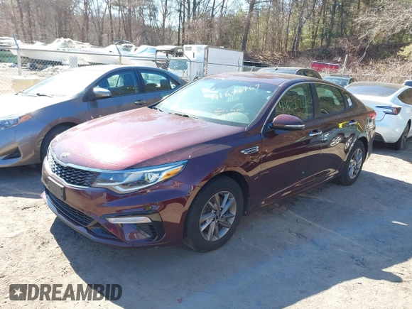 2020 Kia Optima LX with VIN 5XXGT4L38LG393235, listed as a IAAI auction lot 41676769 with 133,312 mi miles and . Bid and sale history available at carsss.com. Image 2.
