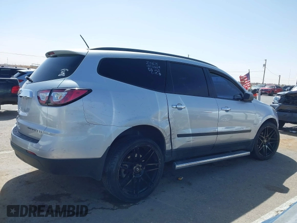 2015 Chevrolet Traverse LS with VIN 1GNKRFEDXFJ388491, listed as a IAAI auction lot 41700140 with 156,233 mi miles and . Bid and sale history available at DreamBid. Image 13.