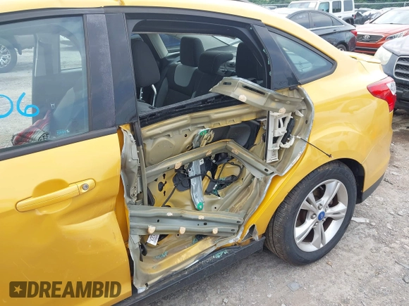 2012 Ford Focus SE with VIN 1FAHP3F2XCL220912, listed as a IAAI auction lot 42246306 with 99,162 mi miles and . Bid and sale history available at DreamBid. Image 6.