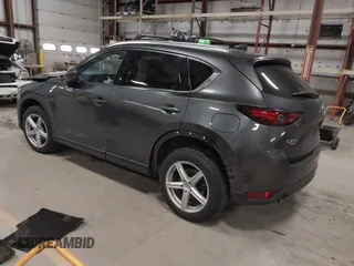 2020 Mazda CX-5 Grand Touring with VIN JM3KFBDM3L0739763, listed as a IAAI auction lot 41751250 with 88,063 mi miles and . Bid and sale history available at carsss.com. Image 3.