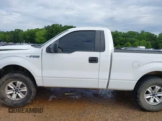2014 Ford F-150 XL with VIN 1FTMF1CM7EFC60291, listed as a IAAI auction lot 42503556 with 215,474 mi miles and . Bid and sale history available at DreamBid. Image 14.