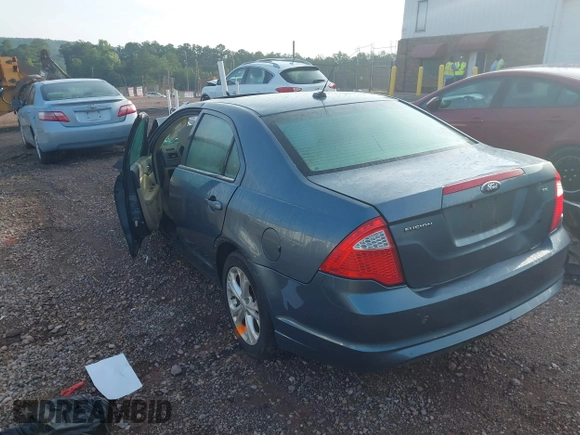 2012 Ford Fusion SE z VIN 3FAHP0HA7CR107455, wystawiony jako IAAI lot #39979687 z przebiegiem 157 764 mil mil oraz . Historia ofert i sprzedaży dostępna na DreamBid. Obrazek 3.
