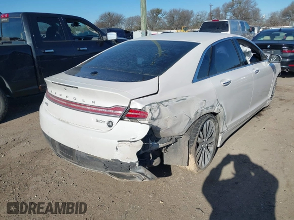 2017 Lincoln MKZ Reserve z VIN 3LN6L5EC6HR632221, wystawiony jako IAAI lot #41369444 z przebiegiem 96 118 mil mil oraz . Historia ofert i sprzedaży dostępna na DreamBid. Obrazek 4.