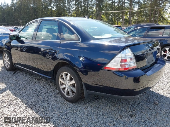 2008 Ford Taurus SEL with VIN 1FAHP24W98G140677, listed as a IAAI auction lot 42087217 with 151,693 mi miles. Bid and sale history available at carsss.com. Image 3.