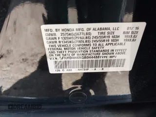 2016 Acura MDX w/Tech with VIN 5FRYD4H4XGB044488, listed as a IAAI auction lot 41963890 with 168,386 mi miles. Bid and sale history available at carsss.com. Image 9.