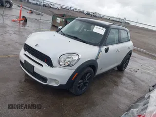 2013 MINI Countryman S ALL4 with VIN WMWZC5C50DWP30199, listed as a IAAI auction lot 42399104 with 103,367 mi miles and . Bid and sale history available at DreamBid. Image 2.