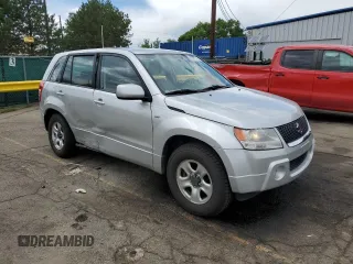 2008 Suzuki Grand Vitara w/Spare & Cargo Covers with VIN JS3TD941784100899, listed as a Copart auction lot 62581725 with 104,502 mi miles and Salvage title. Bid and sale history available at DreamBid. Image 4.