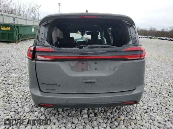 2023 Chrysler Pacifica Touring L with VIN 2C4RC1BG1PR516608, listed as a Copart auction lot 52098625 with Not provided miles and Salvage title. Bid and sale history available at DreamBid. Image 6.