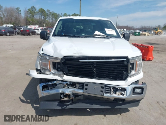 2018 Ford F-150 XL with VIN 1FTEX1EB4JFA77373, listed as a IAAI auction lot 41813197 with 235,251 mi miles and . Bid and sale history available at DreamBid. Image 13.