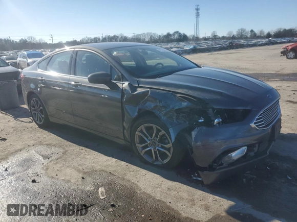 2017 Ford Fusion S with VIN 3FA6P0G76HR201606, listed as a Copart auction lot 41729265 with 124,475 mi miles and Salvage Title. Bid and sale history available at DreamBid. Image 4.