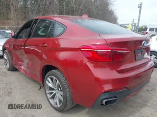 2016 BMW X6 sDrive35i with VIN 5UXKU0C52G0F93330, listed as a IAAI auction lot 41899939 with 126,404 mi miles. Bid and sale history available at carsss.com. Image 3.