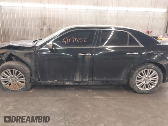 2013 Chrysler 300 with VIN 2C3CCAKT1DH667134, listed as a IAAI auction lot 41891856 with 162,489 mi miles. Bid and sale history available at carsss.com. Image 15.