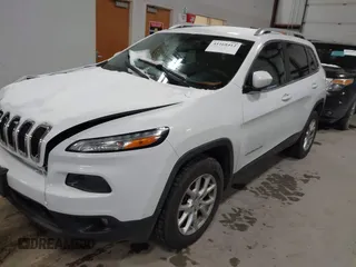 2015 Jeep Cherokee Latitude z VIN 1C4PJMCB4FW635406, wystawiony jako IAAI lot #41168412 z przebiegiem 131 089 mil mil oraz . Historia ofert i sprzedaży dostępna na DreamBid. Obrazek 2.
