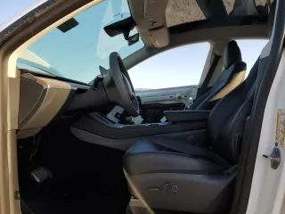 2023 Tesla Model Y Long Range z VIN 7SAYGDEE8PA069248, wystawiony jako Copart lot #74120944 z przebiegiem 17 085 mil mil oraz Szkoda całkowita • Salvage title. Historia ofert i sprzedaży dostępna na DreamBid. Obrazek 7.