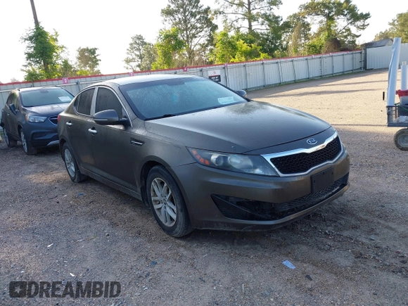 2011 Kia Optima LX with VIN KNAGM4A74B5085319, listed as a IAAI auction lot 42061665 with 224,517 mi miles and . Bid and sale history available at carsss.com. Image 1.