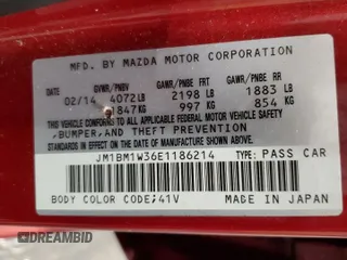 2014 Mazda 3 S Grand Touring z VIN JM1BM1W36E1186214, wystawiony jako Copart lot #53158345 z przebiegiem 126 241 mil mil oraz Czysty tytuł • Clean title. Historia ofert i sprzedaży dostępna na DreamBid. Obrazek 12.