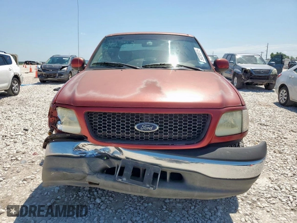 2002 Ford F-150 XL with VIN 1FTRX17202NA40522, listed as a Copart auction lot 58208915 with 100,297 mi miles and Salvage title. Bid and sale history available at DreamBid. Image 5.