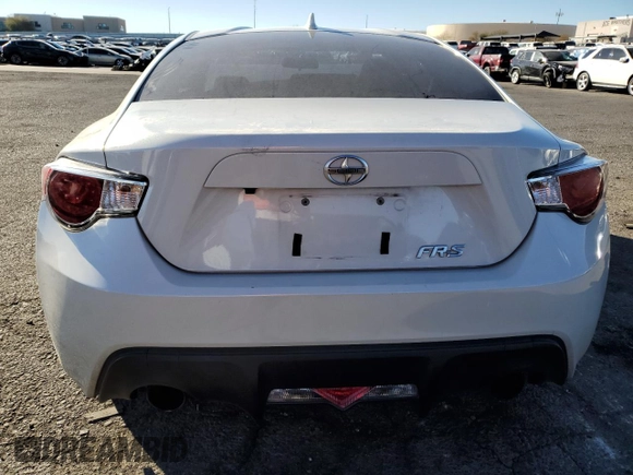 2016 Scion FR-S with VIN JF1ZNAA15G8702077, listed as a Copart auction lot 88819185 with 57,194 mi miles and Salvage Title. Bid and sale history available at carsss.com. Image 6.