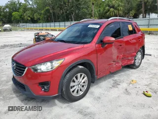 2016 Mazda CX-5 Touring с VIN JM3KE2CY2G0745325, выставлен на аукционе Copart как лот 66653735 с пробегом 87 213 миль миль и Чистый • Clean title. История ставок и продаж доступна на DreamBid. Изображение 1.