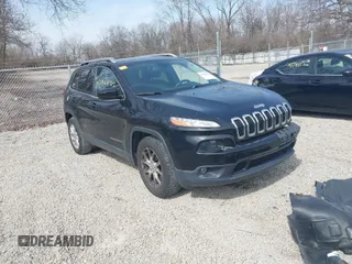 2015 Jeep Cherokee Latitude with VIN 1C4PJLCB3FW517843, listed as a IAAI auction lot 41828715 with 146,862 mi miles and . Bid and sale history available at DreamBid. Image 1.