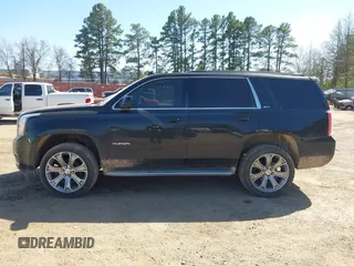 2015 GMC Yukon SLT z VIN 1GKS1BKC8FR112952, wystawiony jako IAAI lot #41836398 z przebiegiem 155 329 mil mil oraz . Historia ofert i sprzedaży dostępna na DreamBid. Obrazek 14.