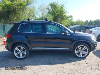 2014 Volkswagen Tiguan S z VIN WVGBV3AX5EW560393, wystawiony jako IAAI lot #42105203 z przebiegiem 102 001 mil mil oraz . Historia ofert i sprzedaży dostępna na DreamBid. Obrazek 14.