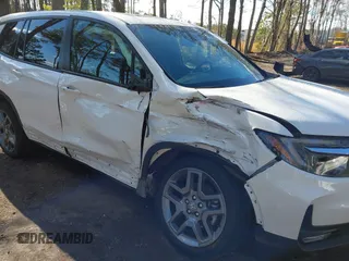2023 Honda Passport EX-L z VIN 5FNYF8H56PB037470, wystawiony jako IAAI lot #41330084 z przebiegiem Nie podano mil oraz . Historia ofert i sprzedaży dostępna na DreamBid. Obrazek 6.
